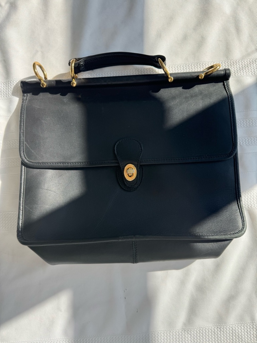 Classic Black Leather Top-Handle Bag with Gold Hardware